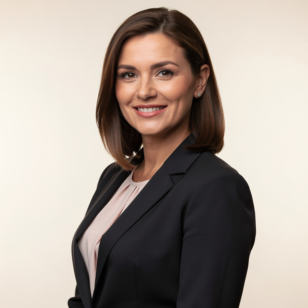 Studio portrait of a European businesswoman in her 40s smiling